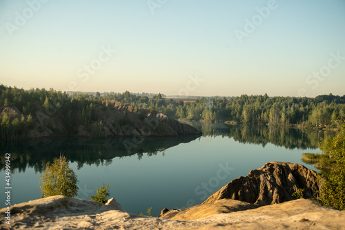 Russia, Tver region, konduki blue river, green forest, blue sky