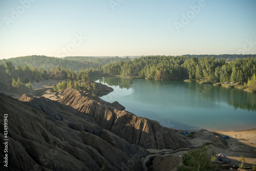 Russia, Tver region, konduki blue river, green forest, blue sky
