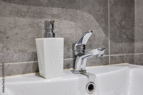 water tap sink with faucet in expensive bathroom