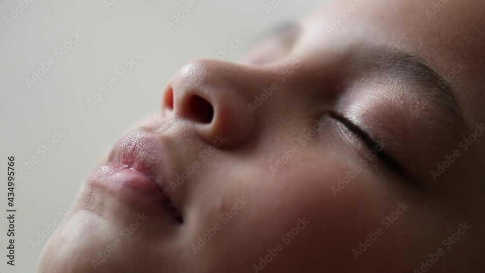 Female little girl eyes macro close-up closing and opening eyes to sky Female little girl eyes macro close-up closing and opening eyes to sky