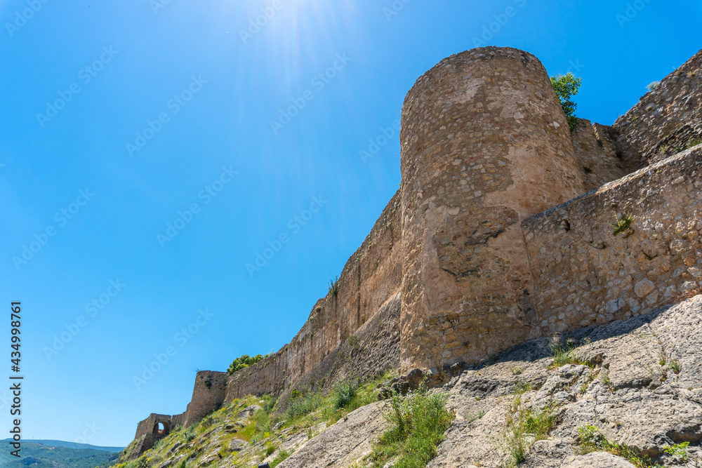 Castle wall of the medieval town of Chulilla in the mountains of the Valencian community. Spain