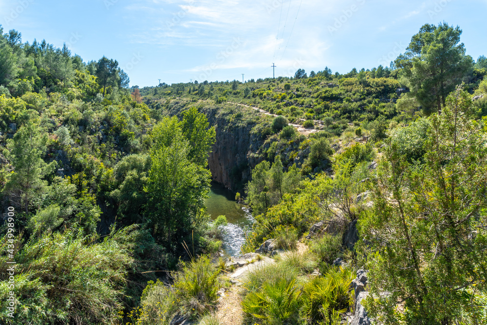 Route of the Pantaneros towards the hanging bridges in the Loriguilla reservoir. Chulilla town in the Valencian community. Spain