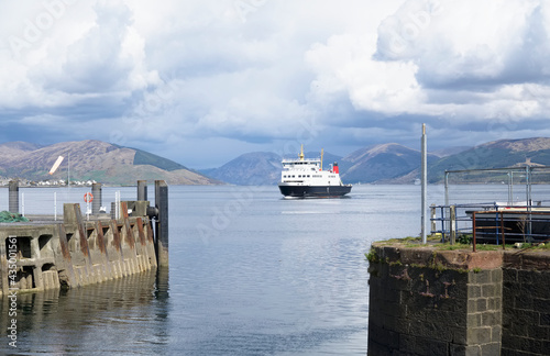 Ferry ship arriving at Scottish island of Rothersay photo