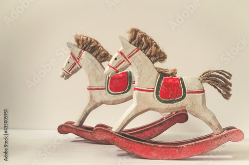 Two vintage wooden toys on the table, competition concept