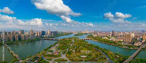 Urban environment at the intersection of Jinhua River，Yangjiang River and Wuyi River, Jinhua City, Zhejiang Province, China photo