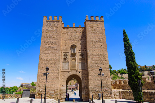 Puente de Alcántara, a Roman arch bridge across the Tagus River in Toledo, Spain photo