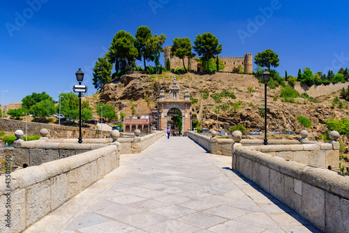 Puente de Alcántara, a Roman arch bridge across the Tagus River in Toledo, Spain photo