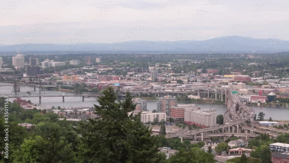 Cityscape of Portland with Columbia River, busy bridge and building, USA Cityscape of Portland with Columbia River, busy bridge and building, USA
