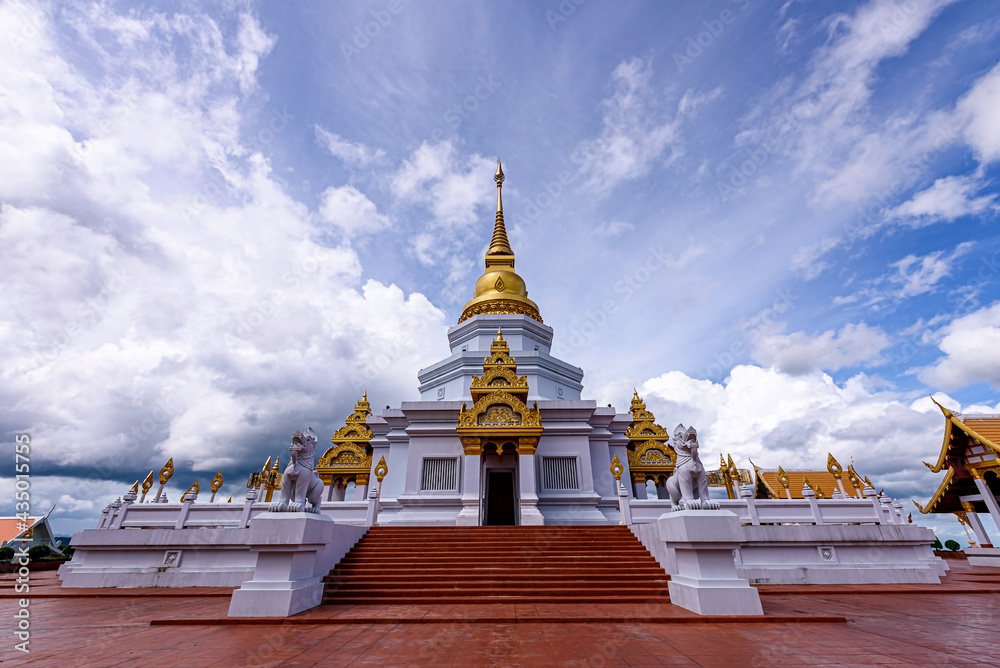 Fototapeta premium Phra Maha Chedi Thepnimittham At Phra That Santitham Temple in Village Mae Salong Nok, Chiang Rai province, Thailand.