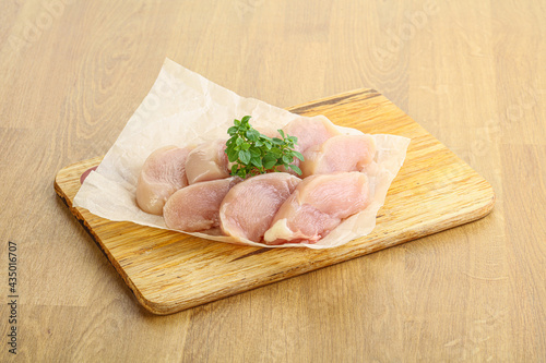 Raw chicken breast slices for cooking