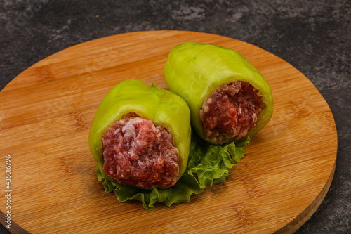 Raw stuffed pepper for cooking