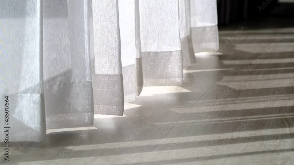 The curtains are moving, window, white fabric
The curtains are moving, window, white fabric