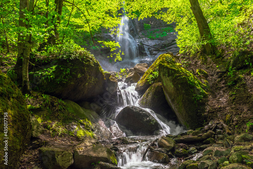 Fototapeta Naklejka Na Ścianę i Meble -  Beautiful waterfall in the green forest
