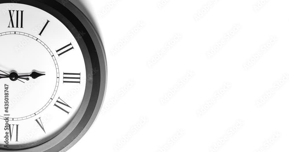 Modern white Wall Clock with black time pointer off center on white background. Shadows on the Clock Face. Concept Clock design with copy space for your own text. Business Clock show the day time Modern white Wall Clock with black time pointer off center on white background. Shadows on the Clock Face. Concept Clock design with copy space for your own text. Business Clock show the day time