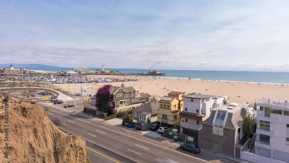 Time Lapse, houses by the beach and people at Santa Monica beach Time Lapse, houses by the beach and people at Santa Monica beach