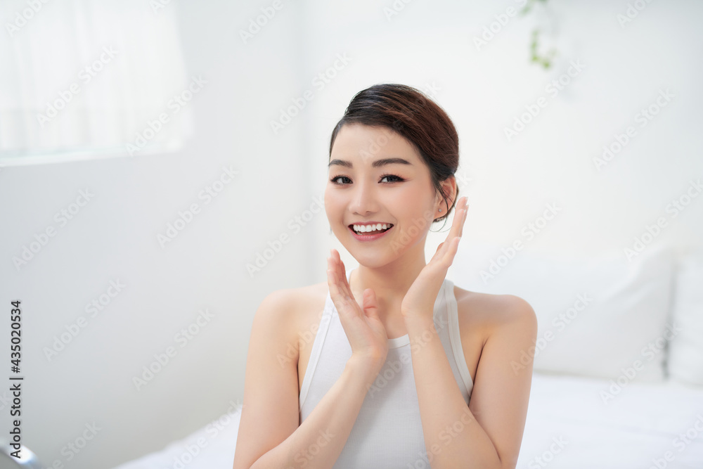 Beautiful young asian woman with clean fresh skin on white background, Beautiful young asian woman with clean fresh skin on white background,