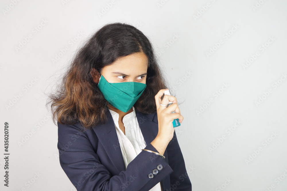 Girl Wearing Mask In Office , corona warriors , face mask , using sanitizer images . Girl Wearing Mask In Office , corona warriors , face mask , using sanitizer images .