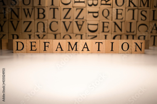The word defamation end was created from wooden cubes. Countries and politics photo