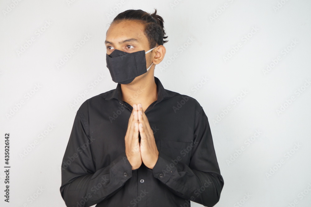 young man wearing mask , face mask , corona warriors , using sanitizer image . Vastav Kharat . young man wearing mask , face mask , corona warriors , using sanitizer image . Vastav Kharat .