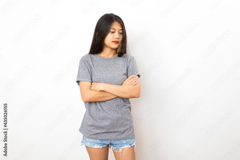 Asian college student smile and standing isolated on white background. Asian college student smile and standing isolated on white background.