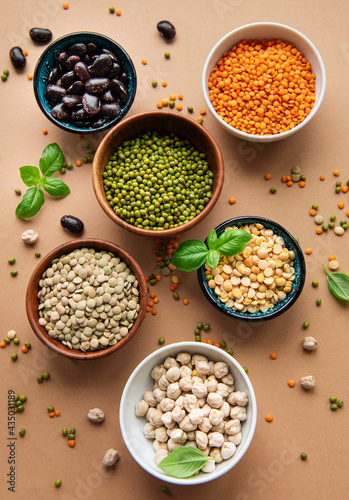 Bowls with different types of legumes