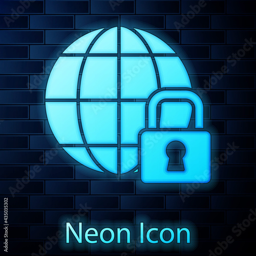 Glowing neon Global lockdown - locked globe icon isolated on brick wall background. Vector