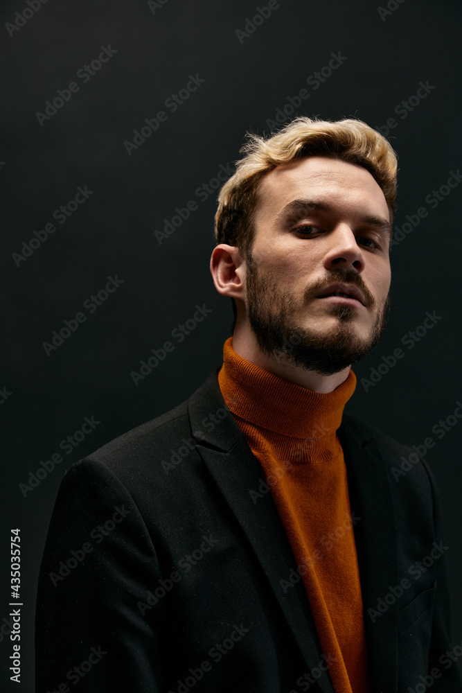 Fototapeta premium man with beard and hairstyle orange sweater jacket model 