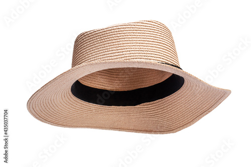 Woman's straw beach hat isolated on white. photo