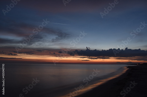 Beautiful sunset over calm sea Liepaja Latvia
