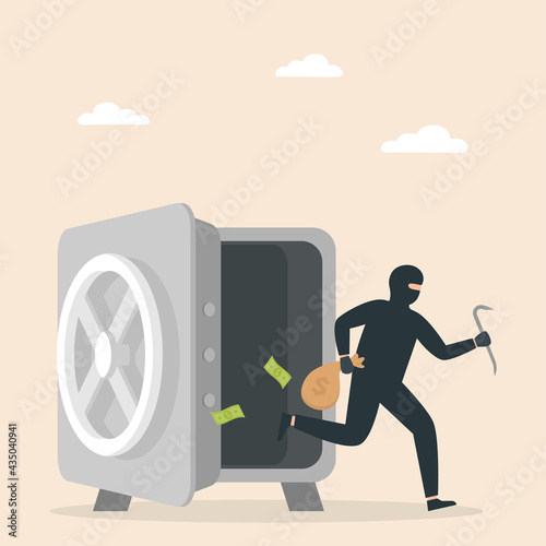 Robber. Thief steals money from an open safe.