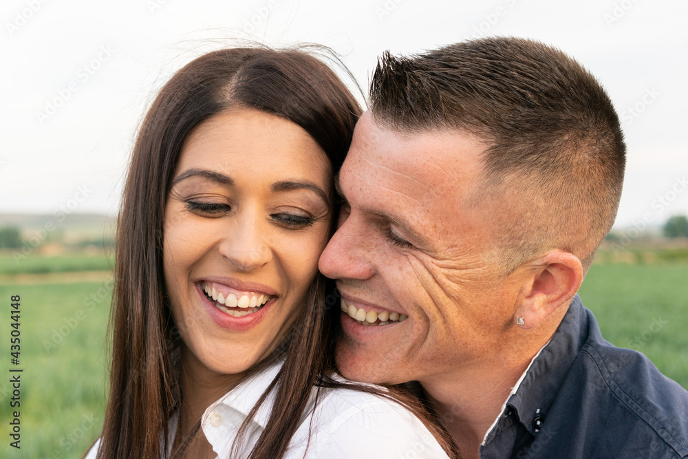 portrait of couple in love in the field portrait of couple in love in the field
