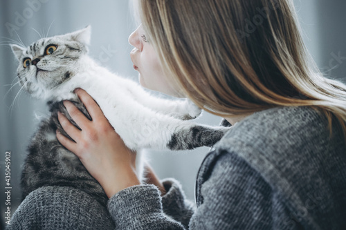 Canvas Print Young beautiful woman with cat. High quality photo