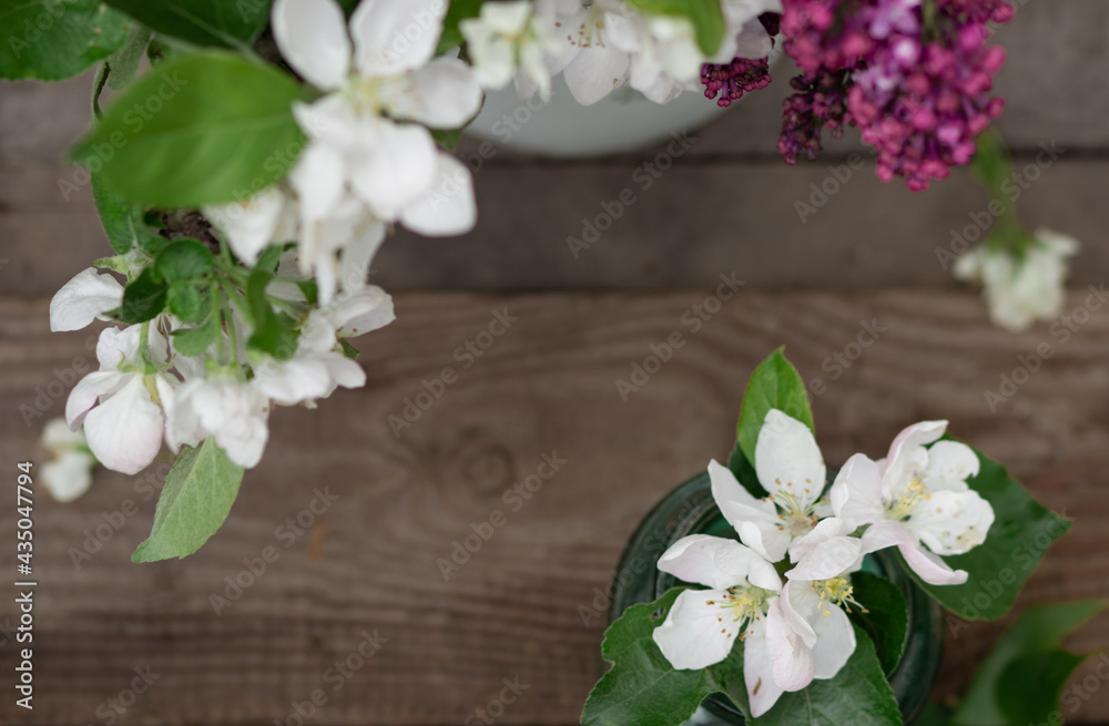 frame of apple and lilac flowers, shot close-up frame of apple and lilac flowers, shot close-up