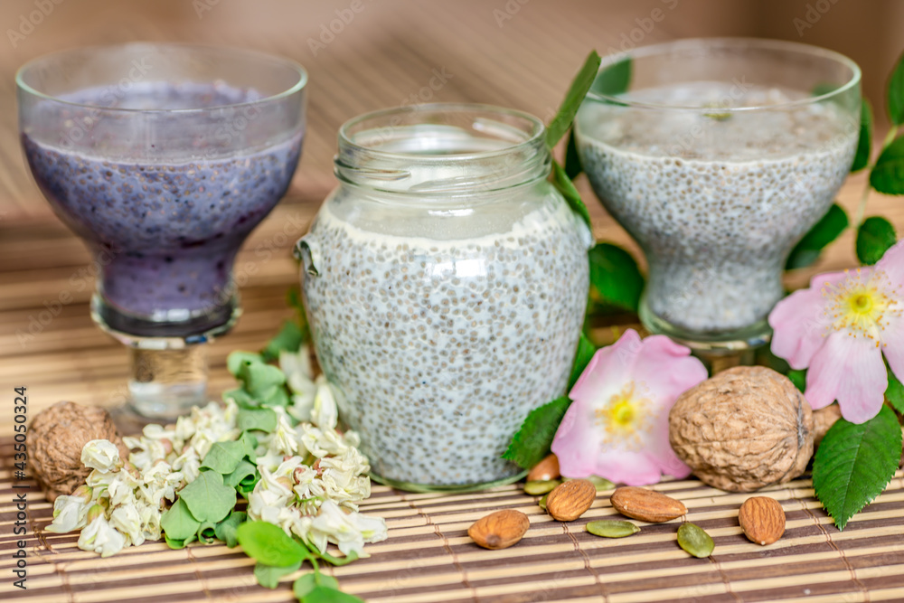 Chia seed pudding made with almond milk in wooden background.Chia seeds serve as a rich plant-based source of Omega-3 fatty acids.