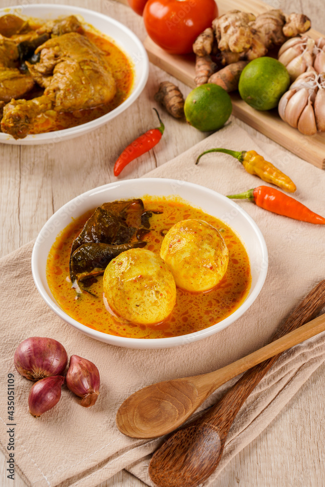 Gulai telur or eggs serve with curry sauce, Gulai Telur is traditional
