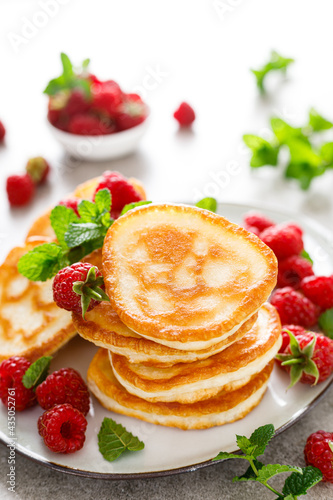 Breakfast pancakes with fresh raspberry