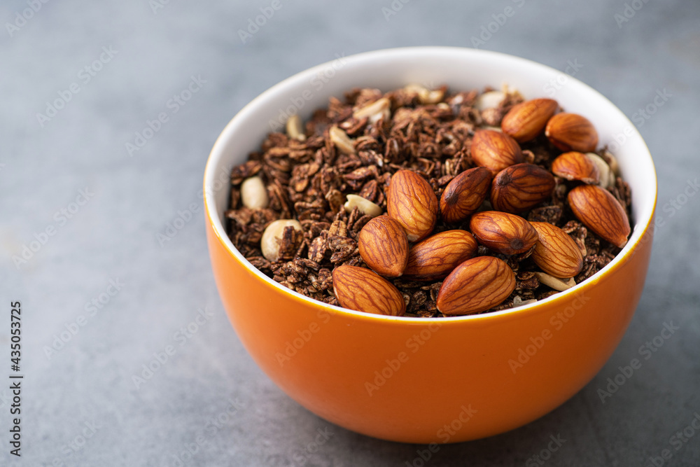 Chocolate granola with peanuts and almonds Chocolate granola with peanuts and almonds