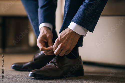 businessman clothes shoes, man getting ready for work, groom in the morning before the wedding ceremony