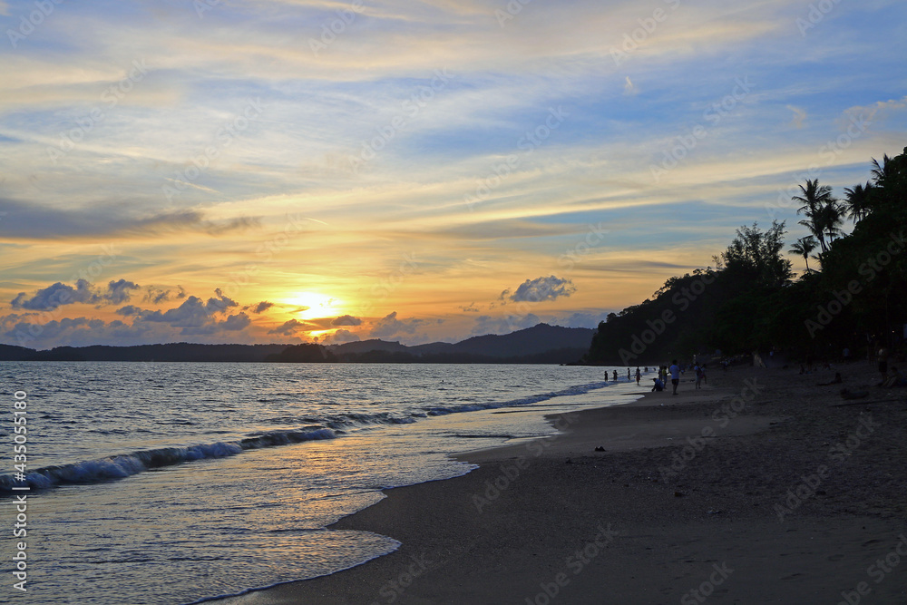 Ao Nang, Thailand. Sunset on the beautiful beach of the village. Ao Nang, Thailand. Sunset on the beautiful beach of the village.