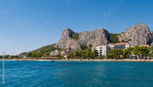 Fototapeta Naklejka Na Ścianę i Meble -  Scenic view at coastal town Omis, picturesque summer touristic place on Adriatic Sea in Croatia, August 2020