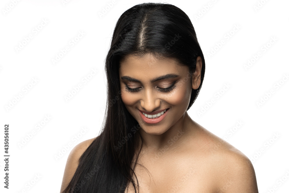 Beautiful Indian woman with smooth skin and long black hair Stock