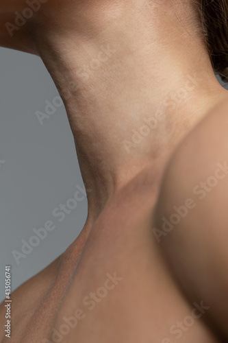 Female neck with a soft skin