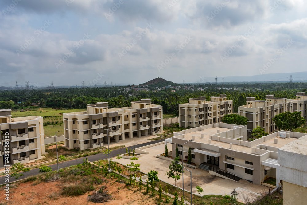 Close view of single floor building looking awesome with greenery tree plantation