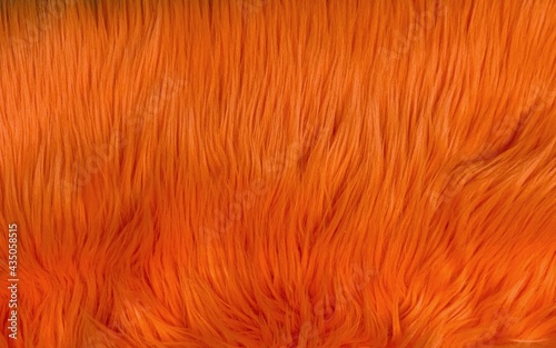 Orange shaggy long pile faux fur texture photo