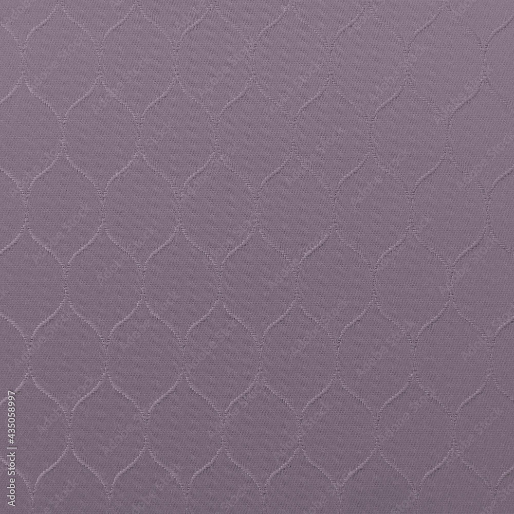 Fototapeta premium Satin fabric texture with a honeycomb design in purple