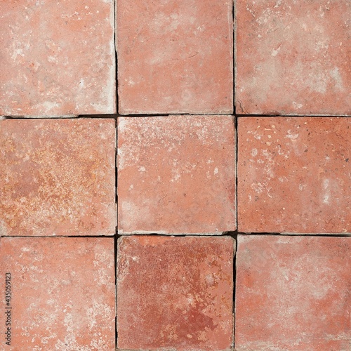 Seamless red reclaimed quarry tile texture for outdoor flooring photo