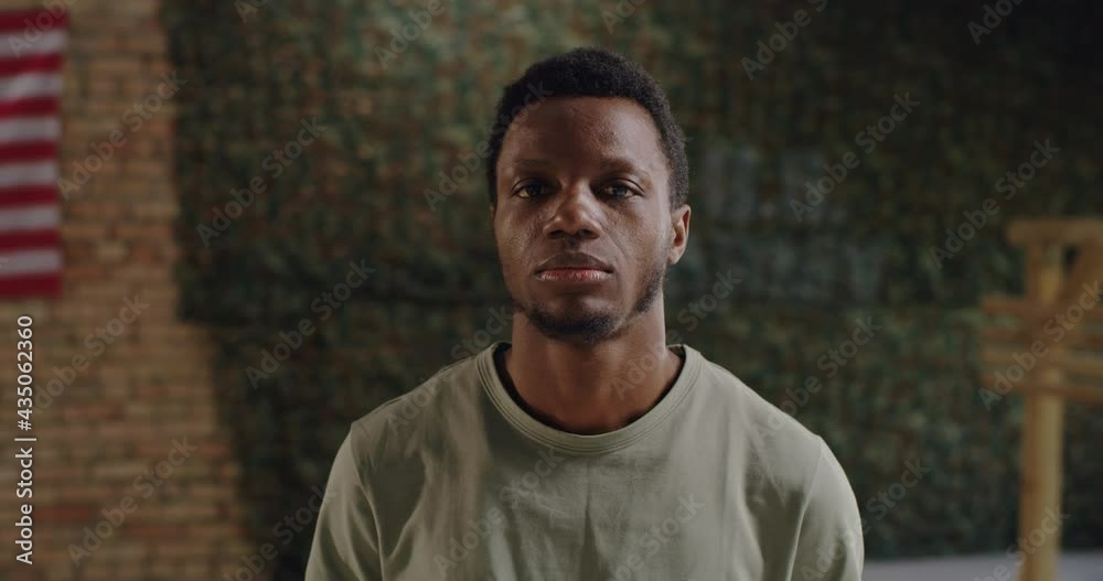 Black soldier in gym of military base Black soldier in gym of military base