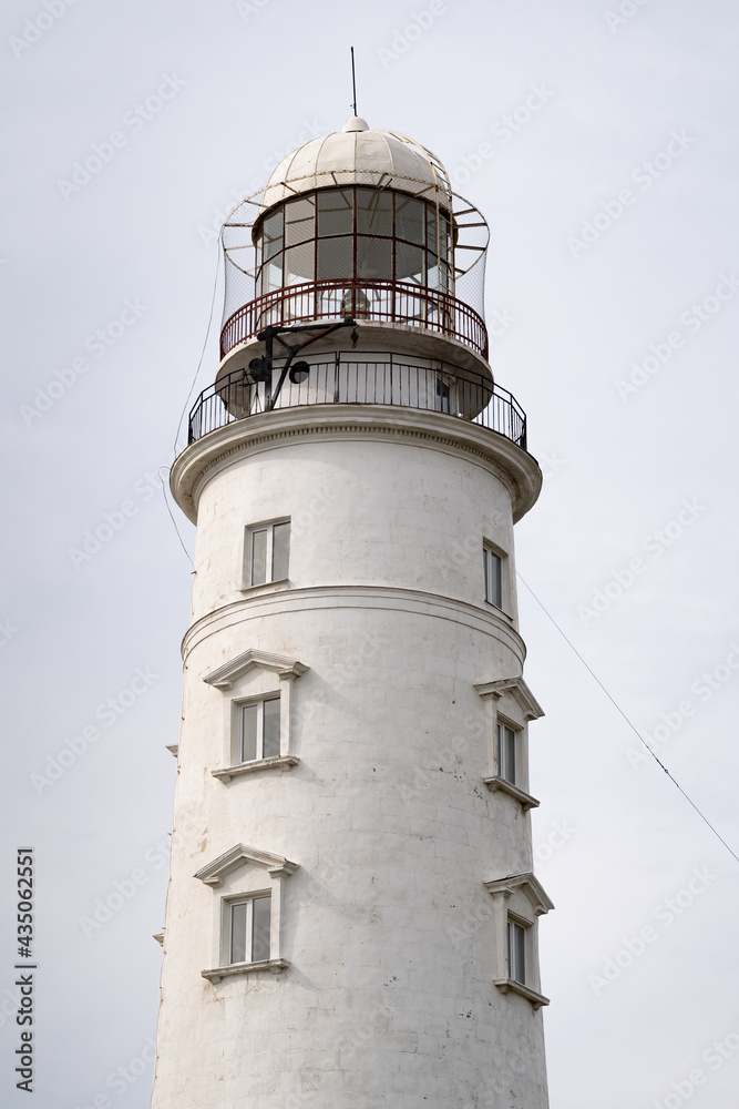 Lighthouse with the sea behind is a wonderful spot for photos