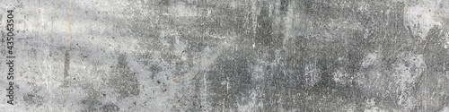 Panoramic front view of grunge old gray colored concrete wall