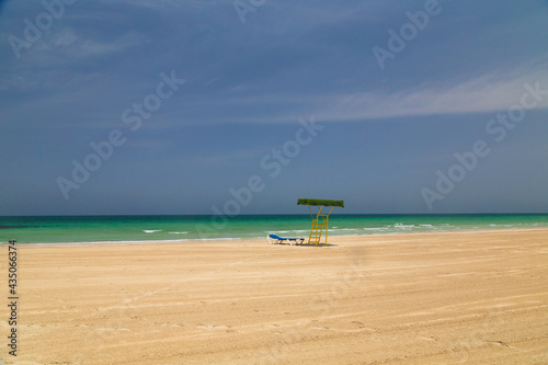 Beach. Blue sea and white sand. Summer time. Seacost